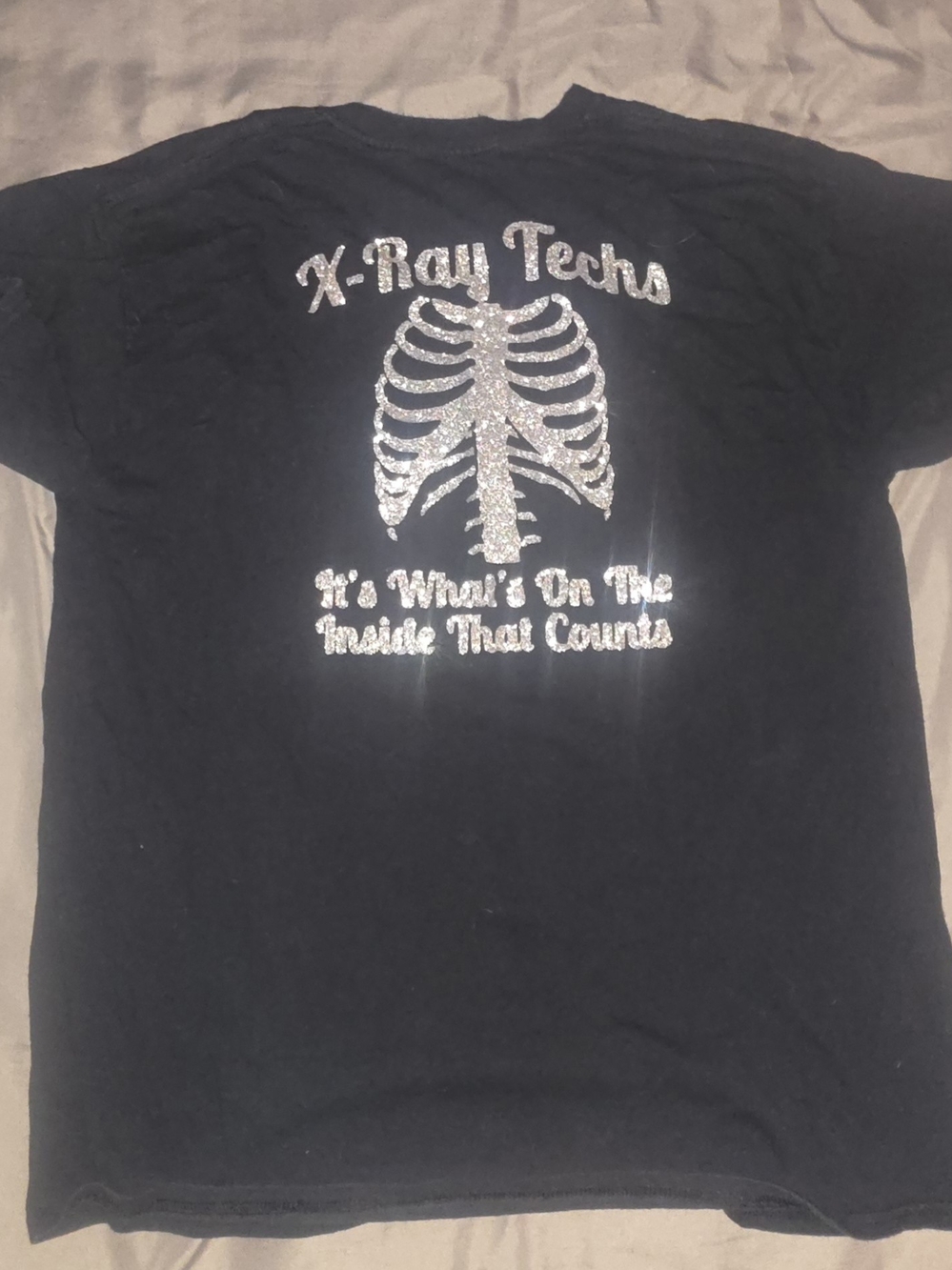 Black "X-Ray Techs" Graphic Tee with Silver Glitter Rib Cage